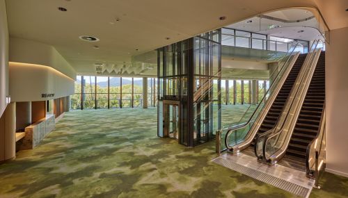 Mezzanine level registration desk and escalator 